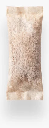 A WAVE pouch, light brown from the functional mushroom blend inside